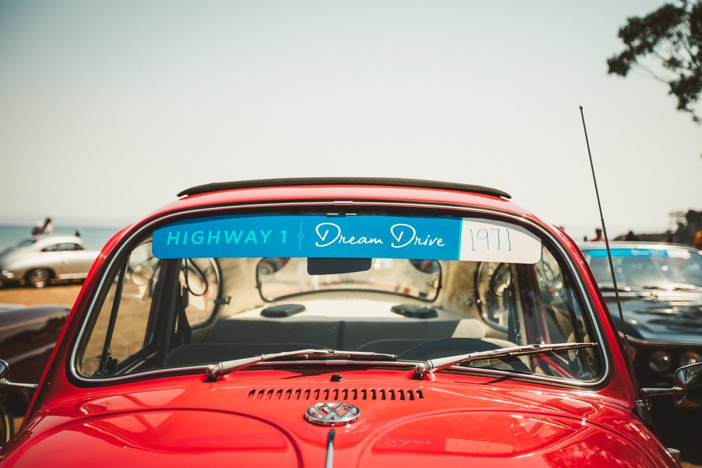 An old VW Beetle on Highway 1 at the Dream Drive